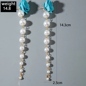 Detail view of blue fabric tulip flower earrings with pearl tassels and dimensions