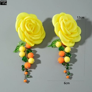 Detail view of yellow camellia earrings with size 12cm by 6cm and weight 22.5g