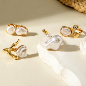 Baroque irregular pearl ring set in gold plated alloy with minimalist aesthetic