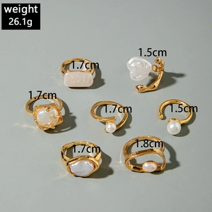 Detailed size chart for 7pcs gold ring set with weight 26.1g and varied diameters