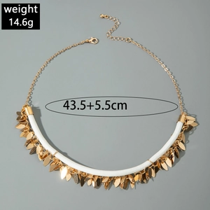 Golden leaf pendant necklace with white cord and adjustable metal lobster clasp