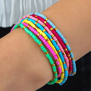 Bohemian multi-layer colorful beaded bracelet set with vibrant slices and gold metal spacers