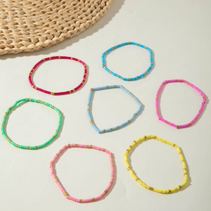 Bohemian colorful beaded stretch bracelets with gold spacers for beach summer style