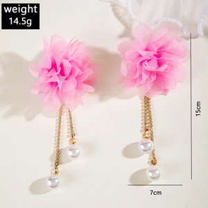 Detail of pink chiffon flower earrings with long rhinestone tassels and pearls
