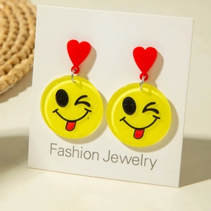 Cute yellow round smiley face earrings with red hearts on white jewelry card