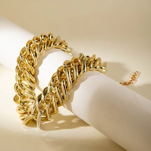 Chunky gold Cuban link necklace with polished finish and adjustable chain for women
