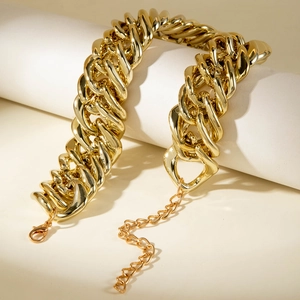 Golden chunky curb chain necklace with polished finish and adjustable lobster clasp