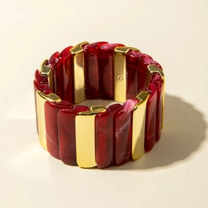 Bracelet manchette rétro en résine marbrée rouge et maillons en métal doré poli
