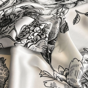Vintage floral printed silk scarf for women featuring black botanical patterns on beige silk