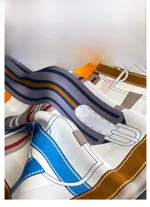 Detailed close-up of premium satin silk square scarf with vintage belt print and rich texture