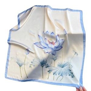 Elegant square silk scarf with blue lotus floral pattern and glossy finish on white base