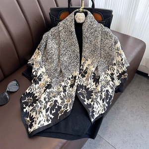 Floral print square scarf in black and white with elegant flower patterns and silky texture