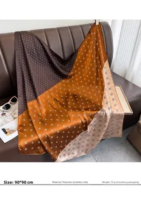 Detail of 90x90cm silk-feel scarf with vintage geometric patterns and polka dots