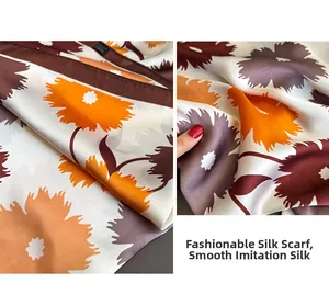 Detail showing the floral print texture and silky polyester fabric of the fashion scarf