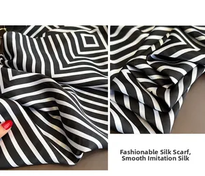 Macro shot of striped satin silk scarf texture with elegant black and white pattern