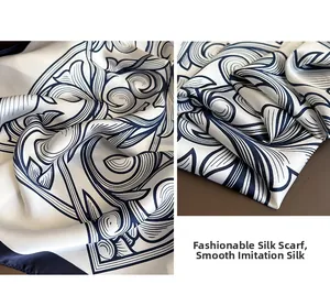 Detail view of printed satin scarf with blue and white vintage floral patterns