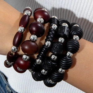 Chic four-piece acrylic beaded bracelet set with red-brown and black textured beads