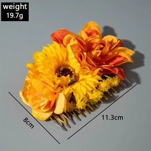 Bohemian floral hair comb featuring yellow sunflower and orange blossoms with metal tines