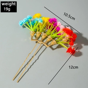 Detail view of colorful bohemian flower hair comb with dimensions 10.5cm by 12cm