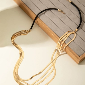 Minimalist multi-layer gold flat snake bone necklace with black rope and lobster clasp
