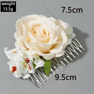 Detailed view of floral hair comb with silk rose, dimensions 7.5cm width and 9.5cm length