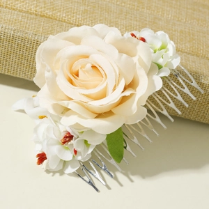 Bohemian floral hair comb with cream roses and white blossoms for wedding styling