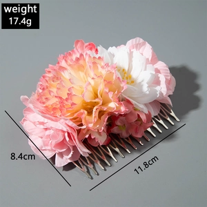 Detail view of floral hair comb showing dimensions 11.8x8.4cm and weight 17.4g