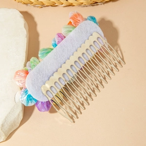 Detail view of the bohemian floral hair comb backing and golden metal comb structure
