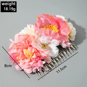 Detailed view of artificial pink peony hair comb with dimensions 11.5cm by 8cm