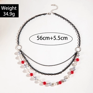 Detail showing colorful beaded layered necklace with lobster clasp and extension chain