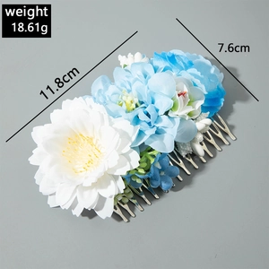 Peigne à cheveux floral avec pétales bleus et blancs et dents en métal argent