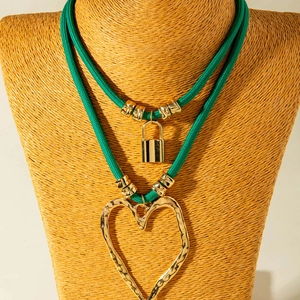 Double-layered green woven cord necklace with gold molten heart and lock pendant