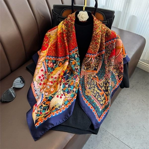 Vintage bohemian floral silk scarf shawl elegantly draped on a black outfit for styling