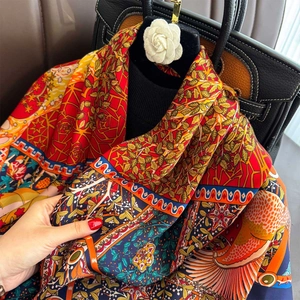 Retro ethnic style silk square scarf with vibrant botanical patterns and luxury gloss