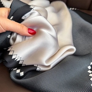 Polka dot and geometric diamond pattern satin square scarf with silky drape and luster
