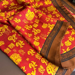 Elegant Chinese red silk scarf featuring golden 'Fu' calligraphy and geometric borders