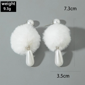 Detailed dimensions of white plush ball earrings with pearls showing 7.3cm length
