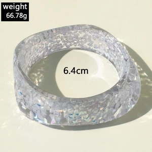 Detail view of square resin bangle with iridescent sequins and 6.4cm diameter size