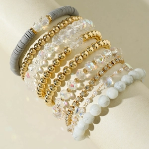 Set di bracciali bohémien multistrato con perle di argilla polimerica e perle finte