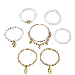Set of 7 bohemian gold and pearl beaded bracelets with shell and starfish pendants