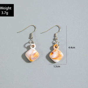 Detail of marble pattern resin earrings with dimensions and weight measurement