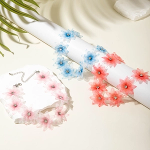 Bohemian floral necklaces in pastel pink, blue, and coral with sparkling rhinestones