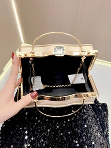 Champagne gold evening clutch bag with rhinestone detail and detachable chain strap
