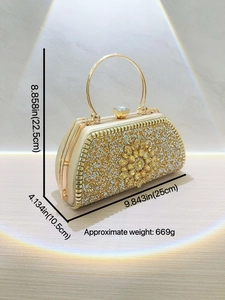 Golden semi-circular rhinestone evening clutch bag with floral jewel and metal ring handle