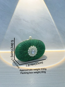 Elegant green pleated oval clutch bag with floral crystal brooch and gold frame detailing