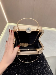 Elegant champagne gold evening clutch bag with crystal handle and detachable chain strap