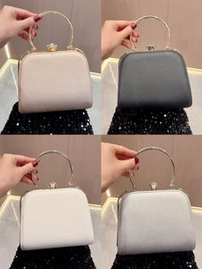 Elegant women's evening clutch bags in gold, black, white, and silver with crystal clasps