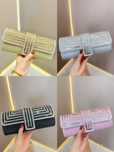 Sparkling geometric rhinestone evening clutch bags in gold, silver, black, and pink colors