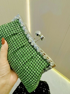 Luxury green rhinestone evening clutch bag with silver metal frame and crystal clasp