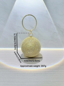 Elegant gold spherical evening clutch bag with sparkling rhinestones and metal ring handle